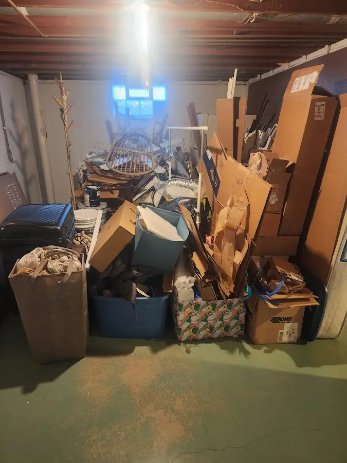 Roll-off dumpster container at job site for 15 Yard Dumpster Rental in Justin